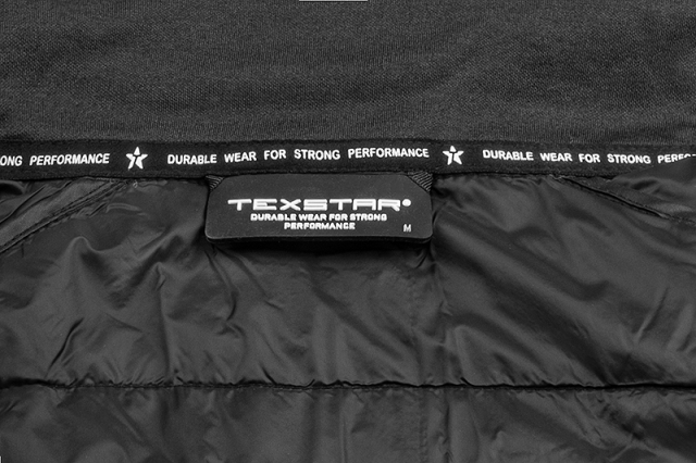 Detaljbild krage svart och mörkgrön tunn flexibel arbetsjacka med huva från Texstar
